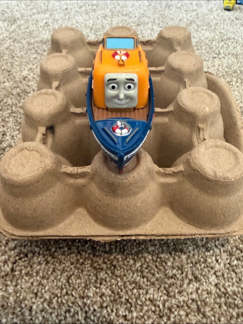 Blue and Orange Kids Toy Boat with Friendly Face